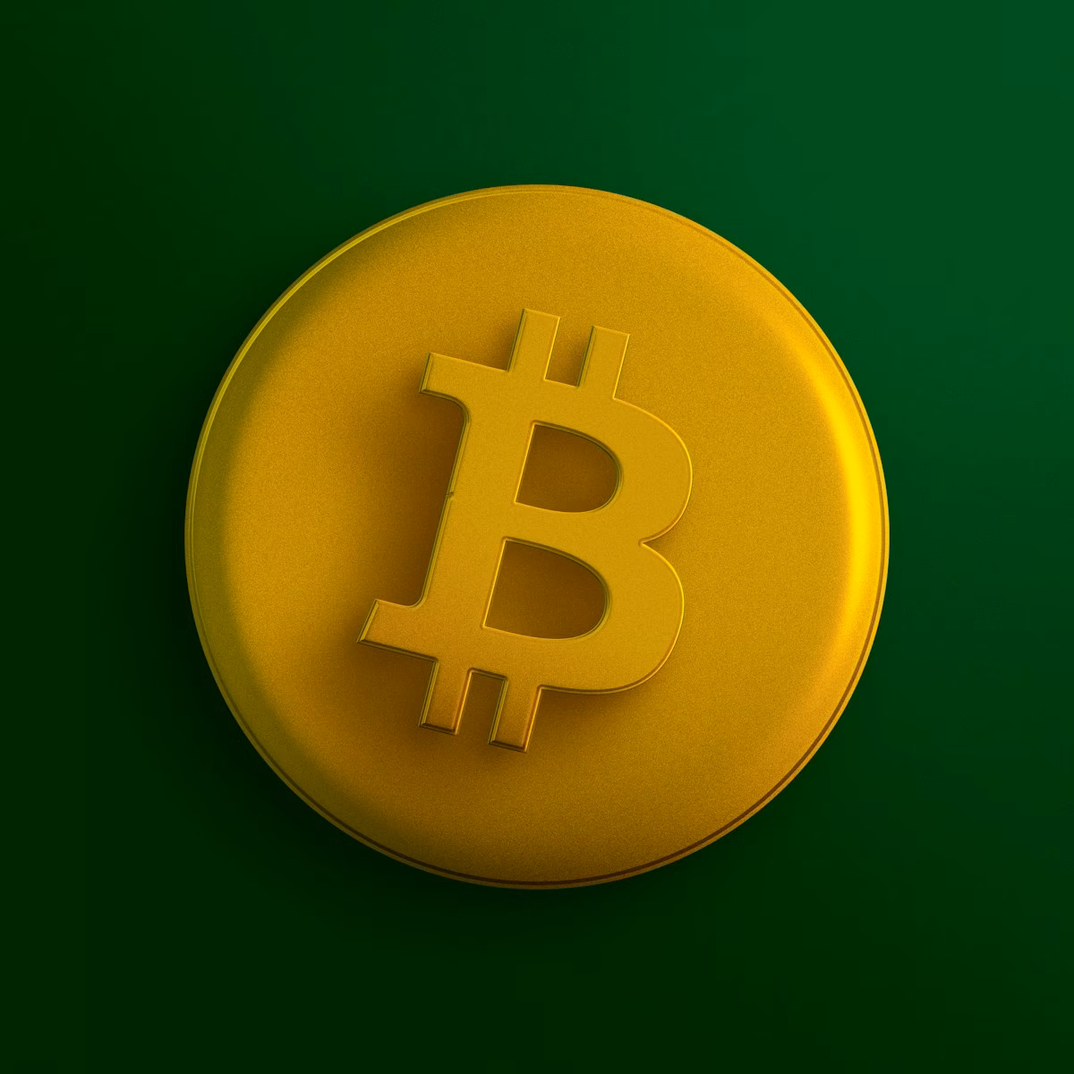 a yellow bit coin sitting on top of a green surface
